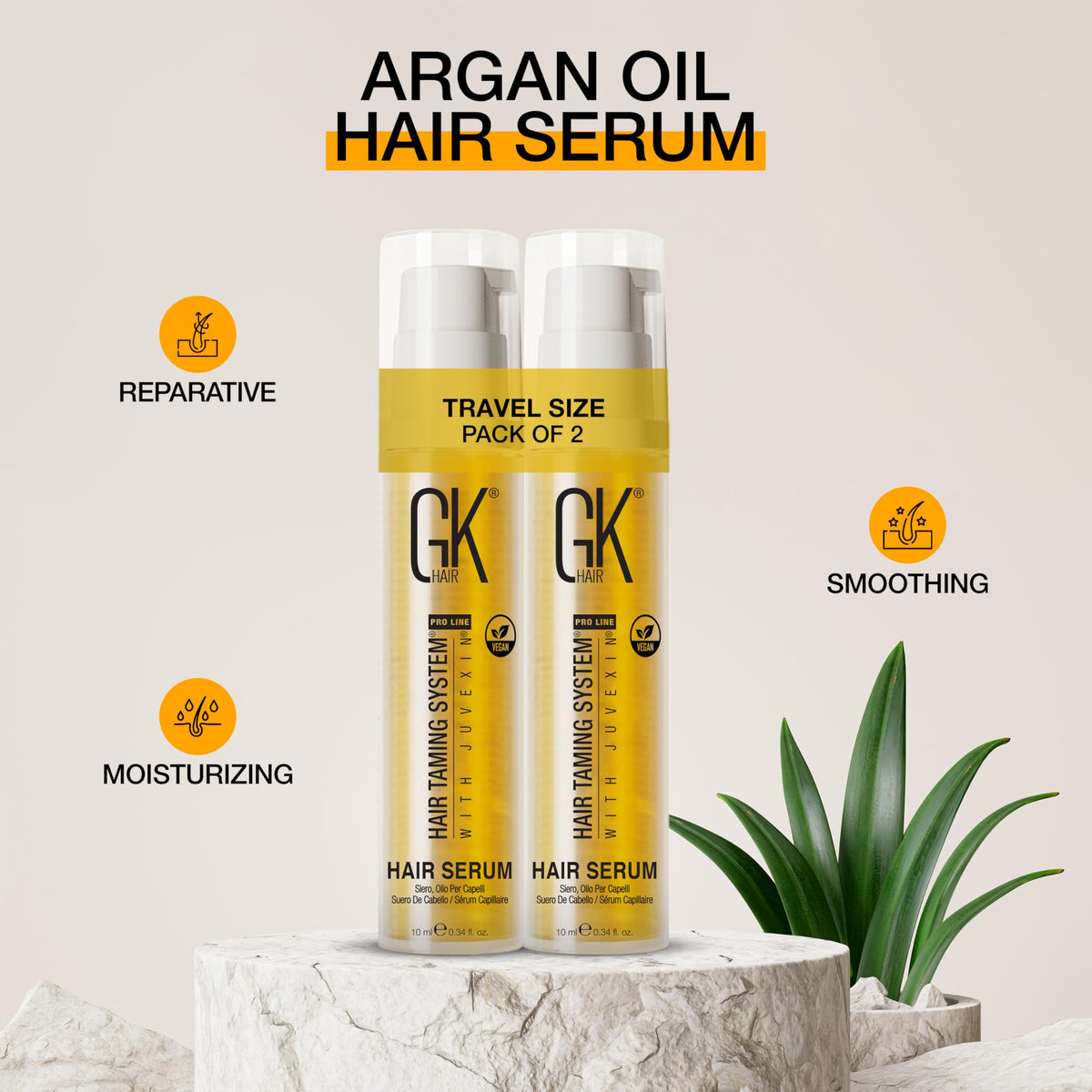 GK HAIR applying serum in hand ready to smooth ends and tame flyaways