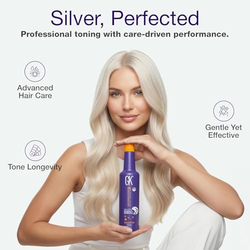 GK HAIR bottle in hand for scale showing compact travel-size benefit