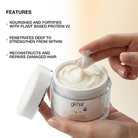 GK HAIR jar held in hand showing 7.05 oz size and travel-ready benefit
