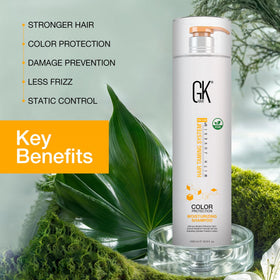 GK HAIR bottle held in hand showing 1L scale and value