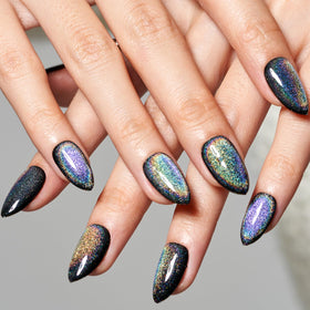 GLAMERMAID lifestyle shot at evening event showcasing dramatic wearable manicure
