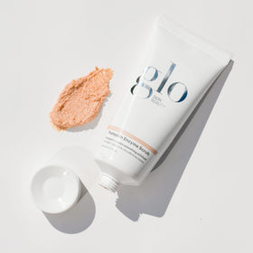 Glo Skin Beauty jar beside pumpkin showing natural enzyme source and eco focus