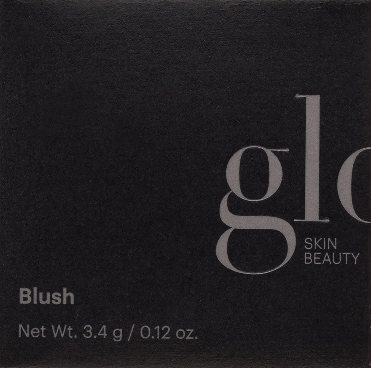 Glo Skin Beauty blush Melody beside hand showing compact size and portability
