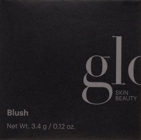 Glo Skin Beauty blush Melody beside hand showing compact size and portability