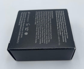 Glo Skin Beauty concealer on bathroom counter by mirror showing everyday routine benefit