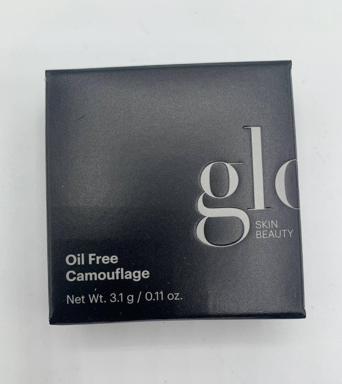 Glo Skin Beauty concealer beside a ruler showing compact travel-friendly size benefit