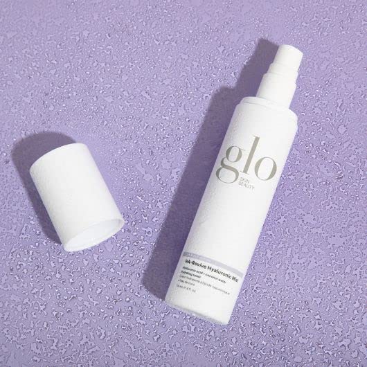 Glo Skin Beauty model using mist for instant refresh and dewy finish