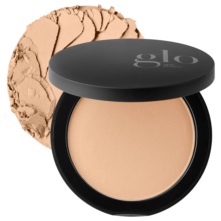 Glo Skin Beauty compact front view showing neat pressed powder finish and portability