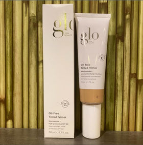 Glo Skin Beauty size comparison next to coin showing 1.7 fl oz scale
