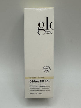 Glo Skin Beauty bottle next to ruler showing compact 1.7 fl oz travel size