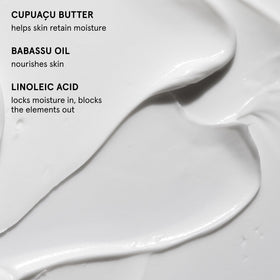 Glossier After Baume open jar top view revealing balm consistency and nourishment