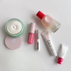 Glossier After Baume packaging label detail highlighting fragrance-free, vegan formulation