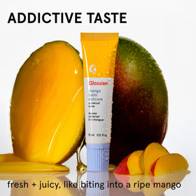 Glossier Balm Dotcom applied on lips gives peach tint and lasting hydration