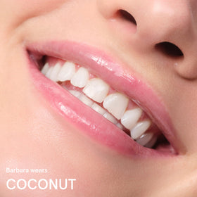 Glossier Balm Dotcom label and ingredient list highlighting moisturizing actives
