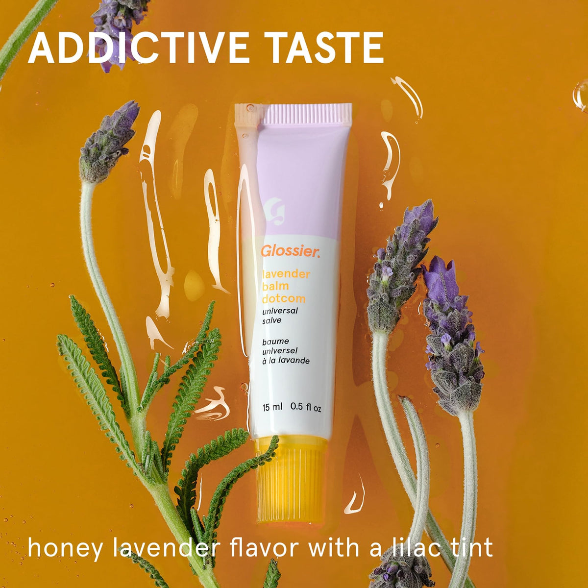 Glossier balm dotcom lilac swipe on lips demonstrating sheer tint and natural finish benefit