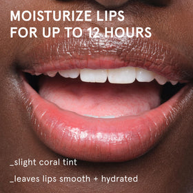 Glossier Balm Dotcom open tube texture close-up highlighting smooth glide