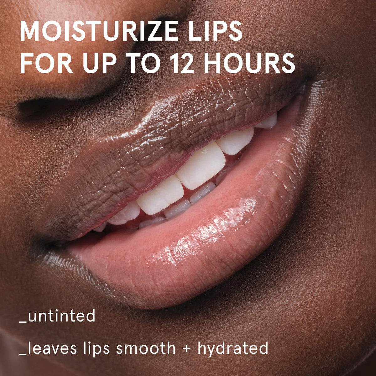 Glossier Balm Dotcom open tube close-up showing smooth balm texture