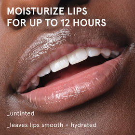 Glossier close-up of Balm Dotcom texture highlighting smooth glide benefit