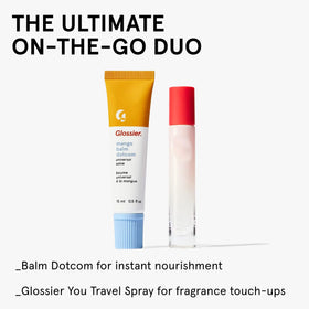 Glossier Balm Dotcom flatlay with other essentials showing daily routine use