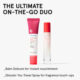 Glossier strawberry swatch beside tube demonstrating tint and glossy finish