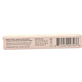 Glossier Boy Brow on model applying clear gel to brows for natural fuller look benefit