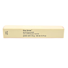 Glossier Boy Brow next to credit card for scale and larger size benefit