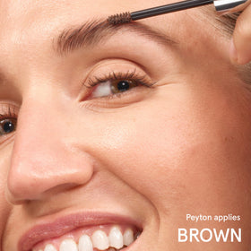 Glossier Boy Brow on vanity near mirror showing effortless everyday styling
