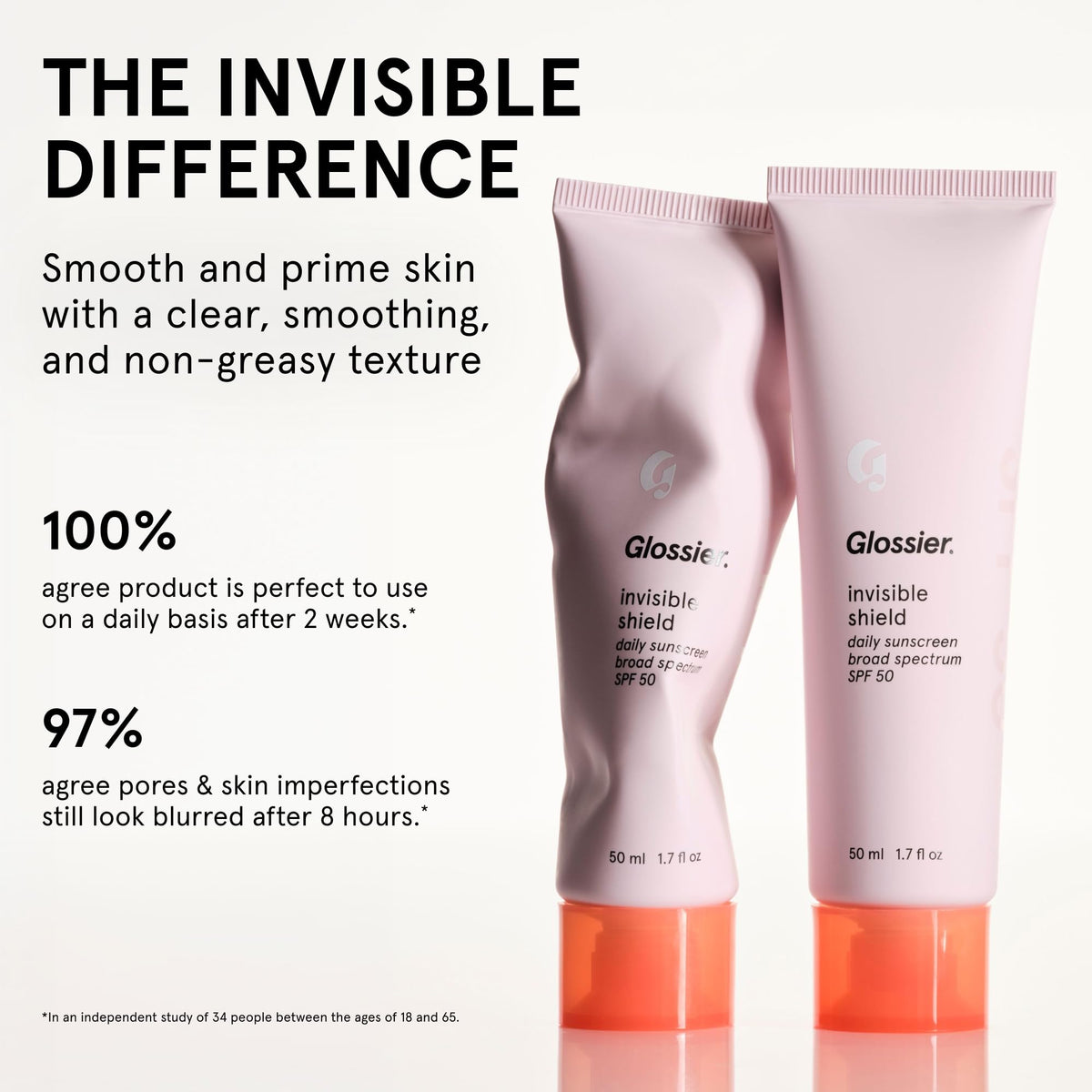 Glossier Invisible Shield tube next to phone showing compact 50 mL travel size