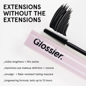 Glossier Lash Slick wand close-up displaying tapered comb for precise, clump-free application