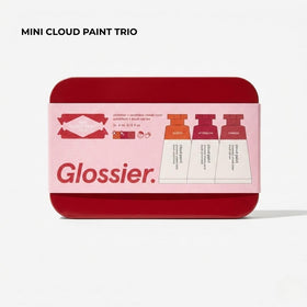 Glossier open tin with three mini tubes displayed for travel convenience