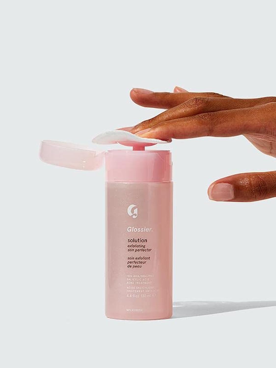 Glossier Solution front bottle showing label and 130 ml size for easy identification and routine use