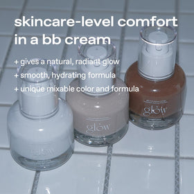 glow applying bb cream on model cheek demonstrating natural coverage and radiant finish