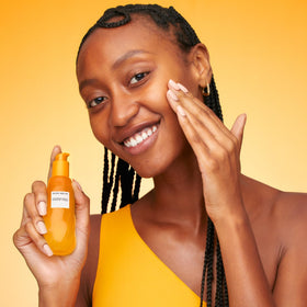 Glow Recipe bottle on bathroom shelf showing part of daily routine benefit