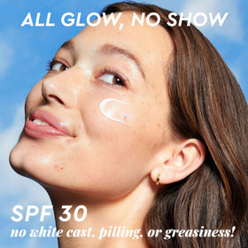 Glow Recipe tube on bathroom shelf conveying travel-ready protection benefit