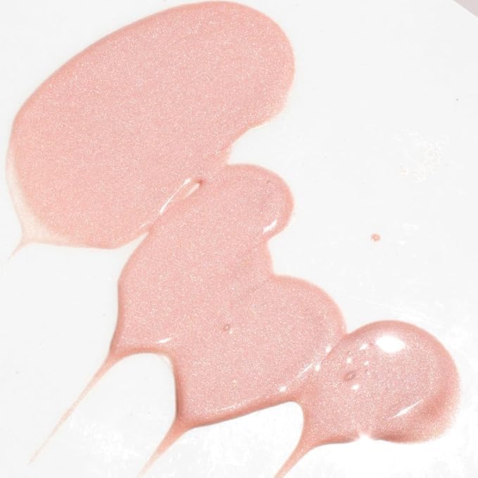 Glowbiotics dropper releasing pink serum to show lightweight texture and hydration benefit