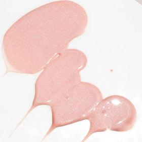 Glowbiotics dropper releasing pink serum to show lightweight texture and hydration benefit