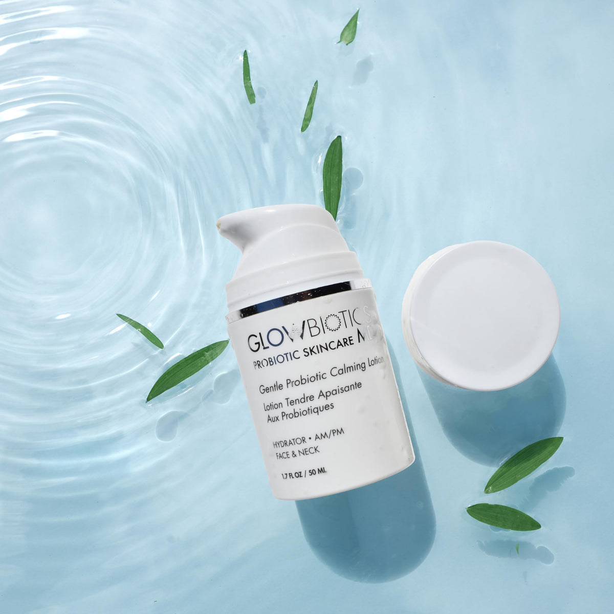 Glowbiotics lotion layered with sunscreen in morning routine to show compatibility and protection