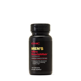 GNC caplet held in hand showing size and simple dosing for daily use