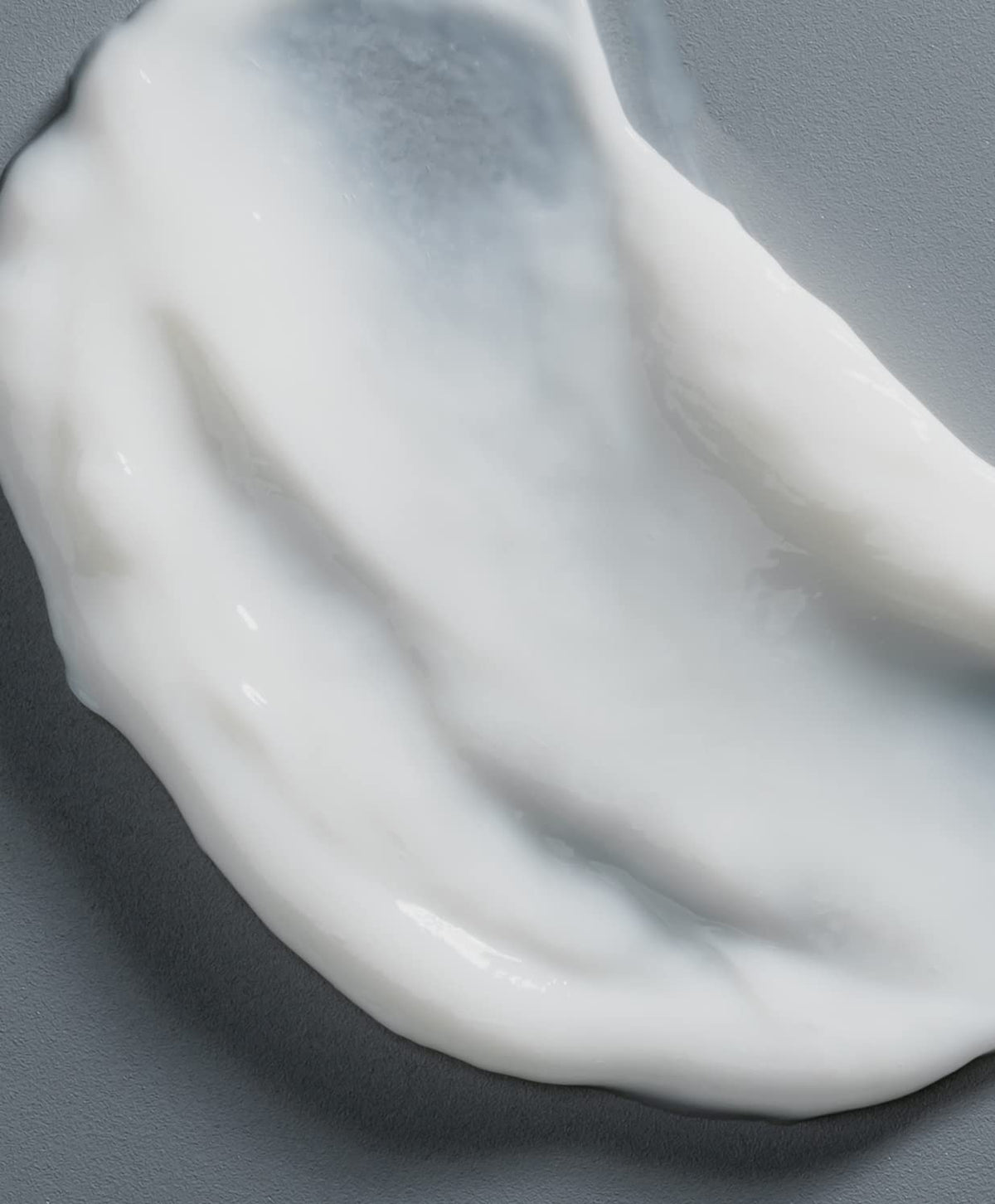 GO247 creamy conditioner texture close-up highlighting smooth, non-greasy formula