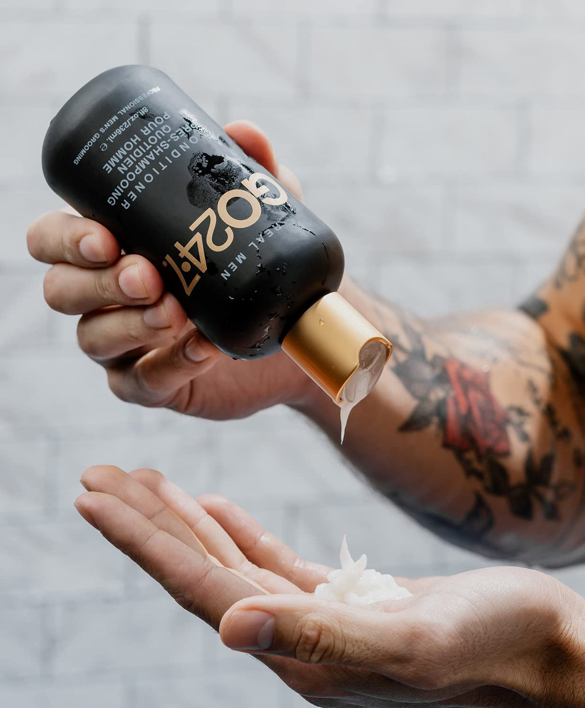 GO247 conditioner being applied in shower demonstrating scalp refresh and ease