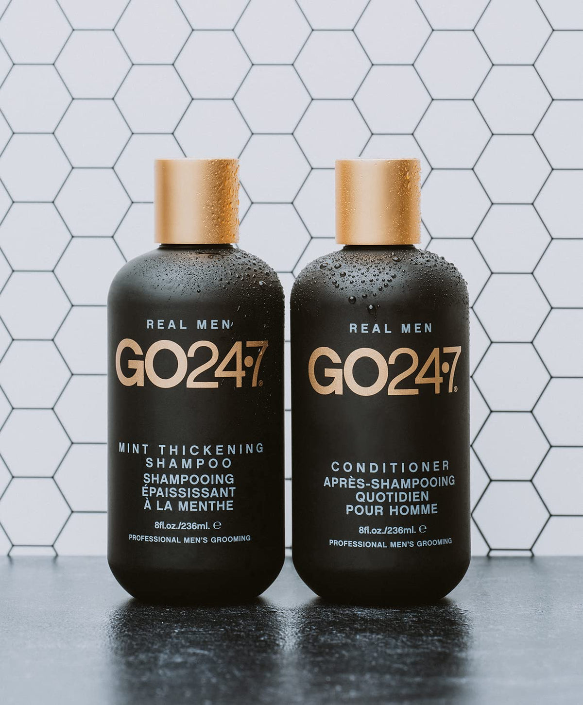 GO247 bottle next to honey drips showing conditioning and hydration