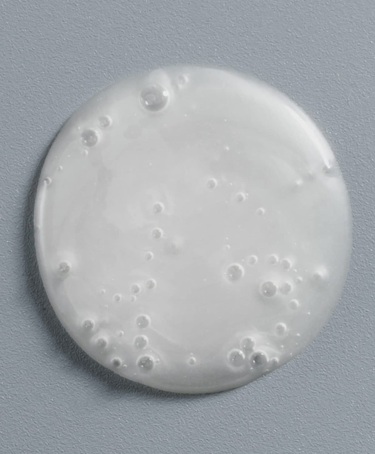 GO247 close-up of shampoo lather demonstrating gentle creamy texture