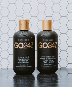 GO247 bottle styled with razor and towel showing grooming routine benefit