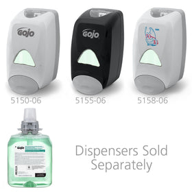 GOJO refill being installed into FMX-12 dispenser for fast changeover