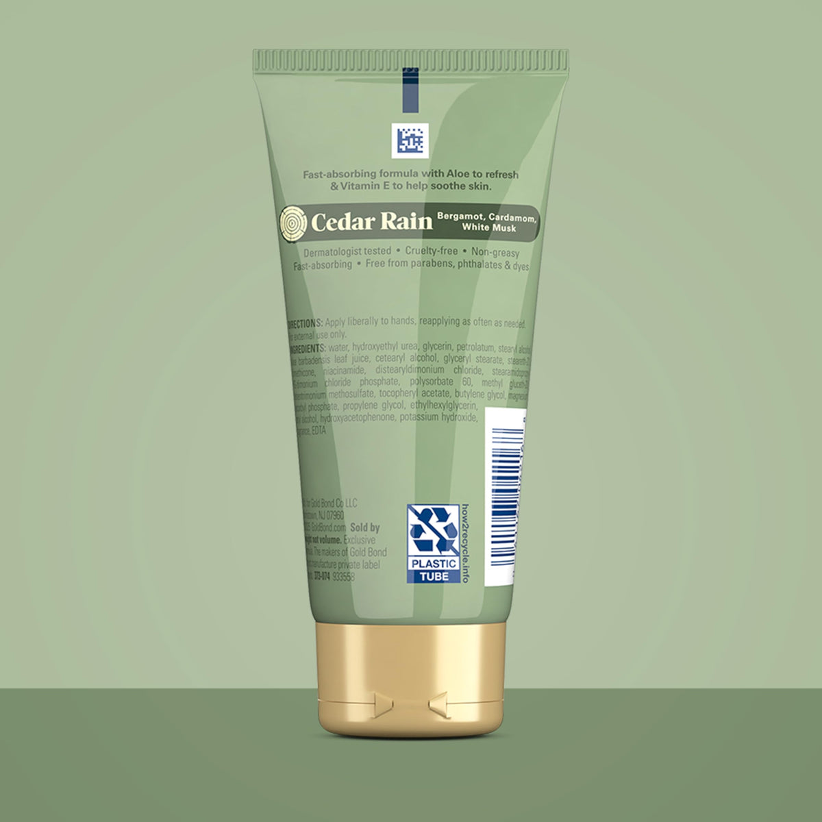 Gold Bond cream texture on fingertip illustrating quick-absorbing, non-greasy feel
