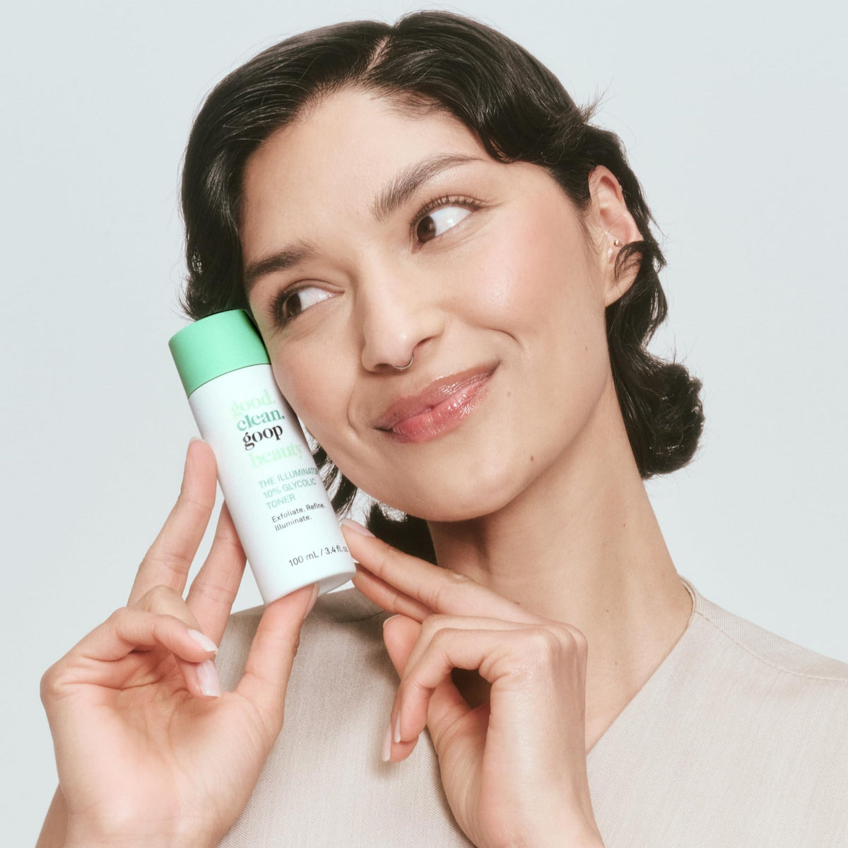 good.clean.goop toner texture on fingertip showing lightweight hydration