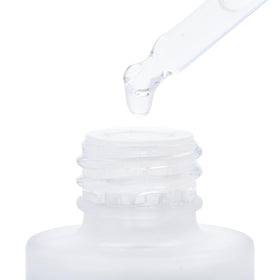 Good Molecules bottle on bathroom shelf suggesting daily routine and organized skincare