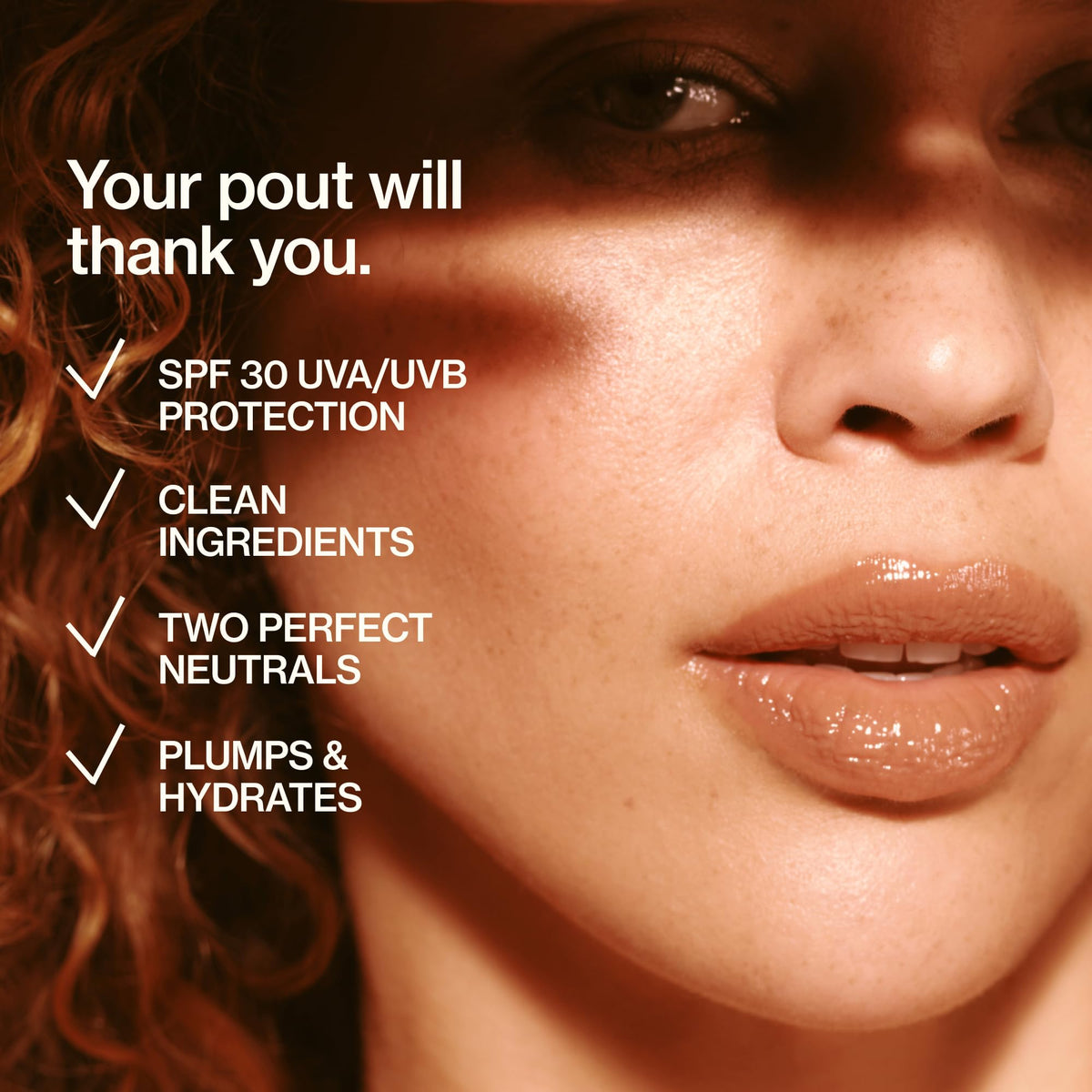 Good Weather Skin close-up lip swatch highlights glossy shine and plumping effect from hyaluronic acid