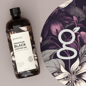 GOODMOOD pour close-up showing thick castor oil texture for deep hydration