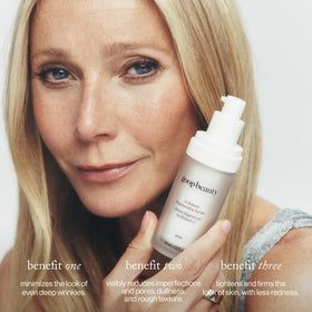 goop Beauty dropper dispensing serum demonstrating controlled application
